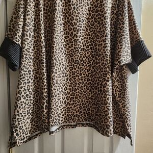 Chic Leopard Print Blouse with Black Trim